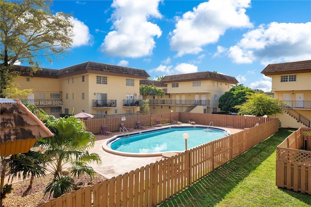 view of swimming pool with a patio