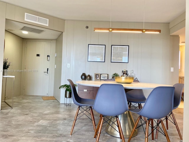 dining room featuring light wood-type flooring