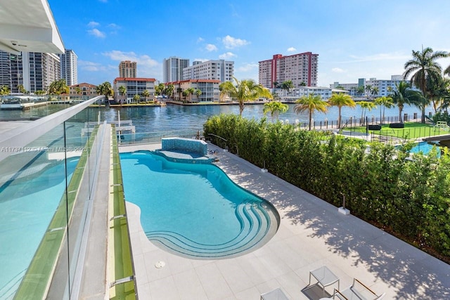 pool with a city view and a water view