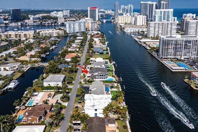 aerial view with a water view and a city view