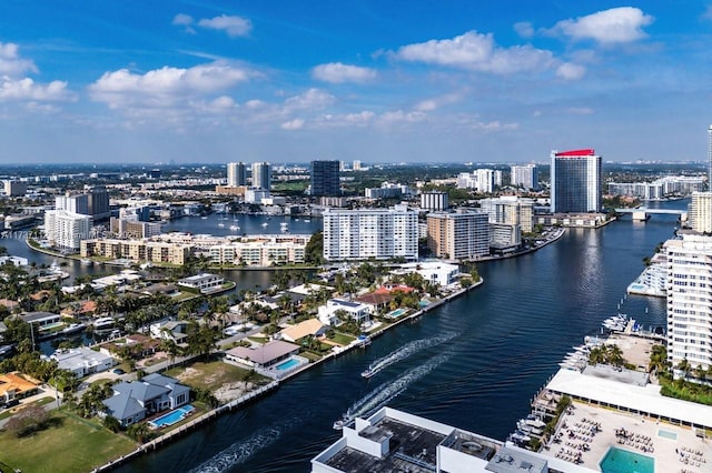 bird's eye view featuring a view of city and a water view