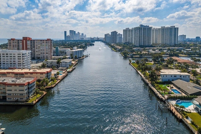 aerial view featuring a view of city and a water view