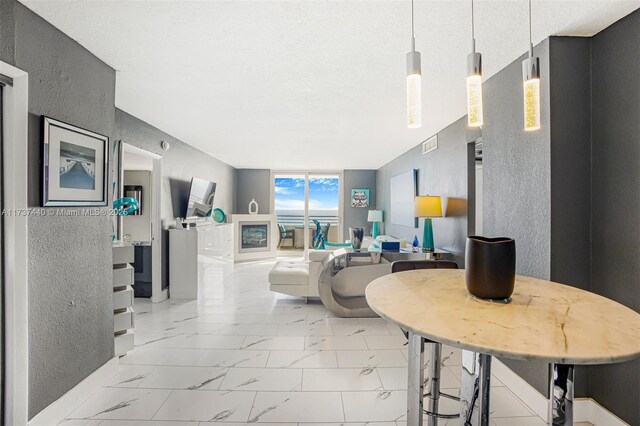 living room with a textured ceiling