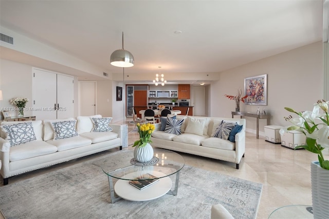 living room with a chandelier