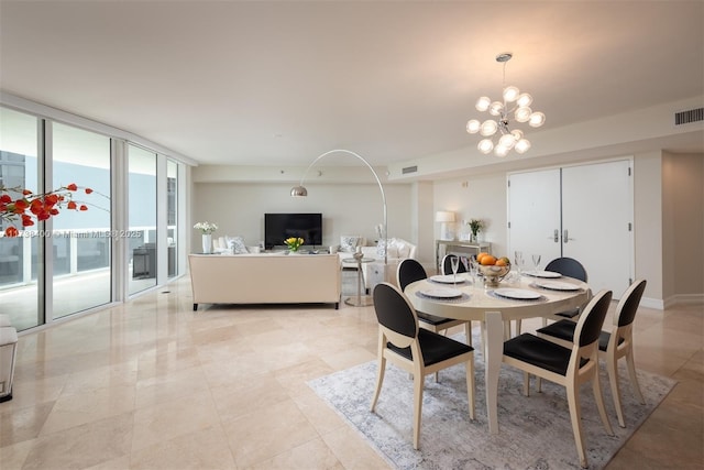 dining area featuring expansive windows