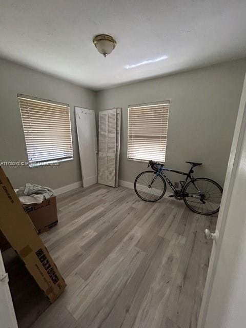 unfurnished bedroom featuring light wood-type flooring