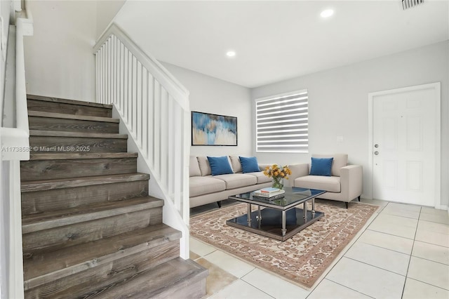 living room with light tile patterned floors