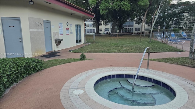 view of patio featuring a community hot tub