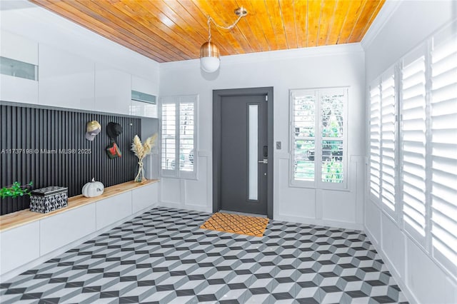 mudroom featuring crown molding and wooden ceiling