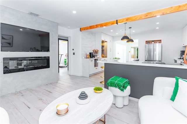 living room featuring light hardwood / wood-style floors