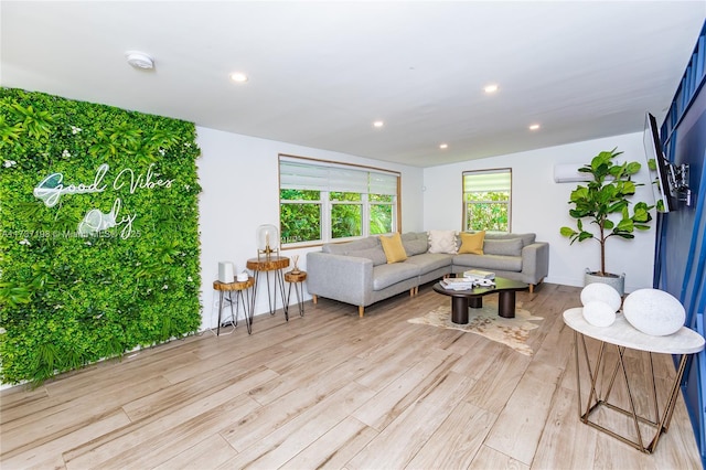 living room with light hardwood / wood-style floors