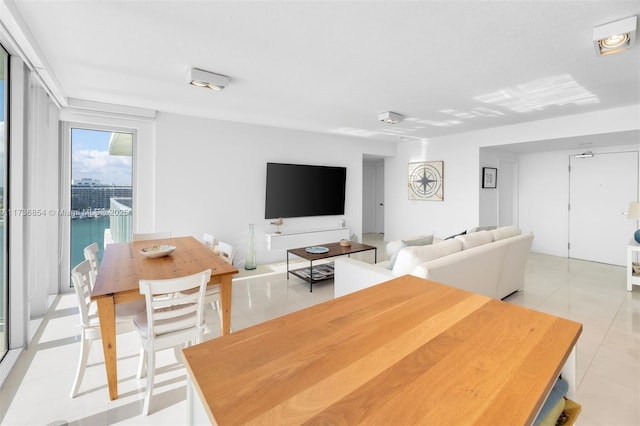 dining room featuring light tile patterned floors