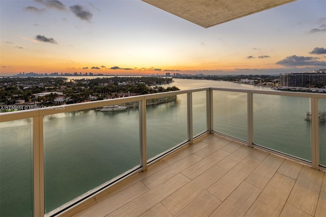 balcony at dusk with a water view