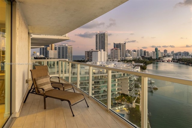 balcony at dusk with a water view