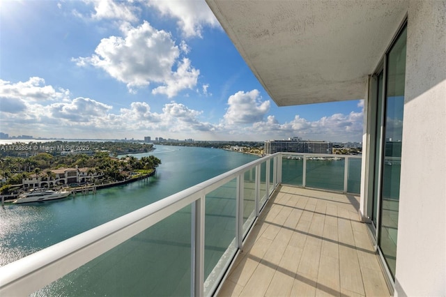 balcony featuring a water view