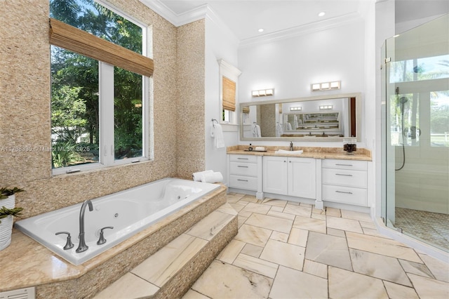 bathroom featuring crown molding, vanity, independent shower and bath, and a wealth of natural light