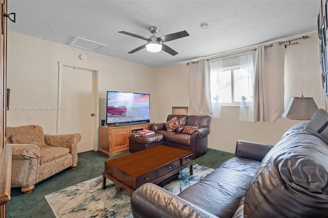 carpeted living room featuring ceiling fan