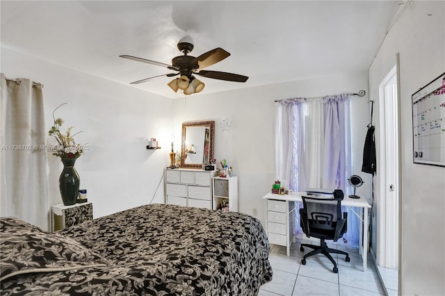 bedroom featuring light tile patterned floors and ceiling fan