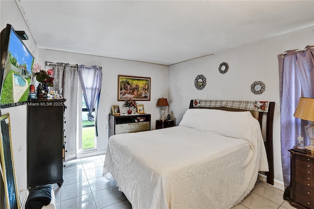 bedroom featuring light tile patterned floors