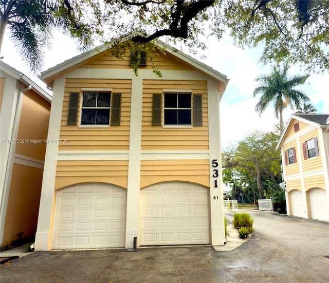 garage with driveway