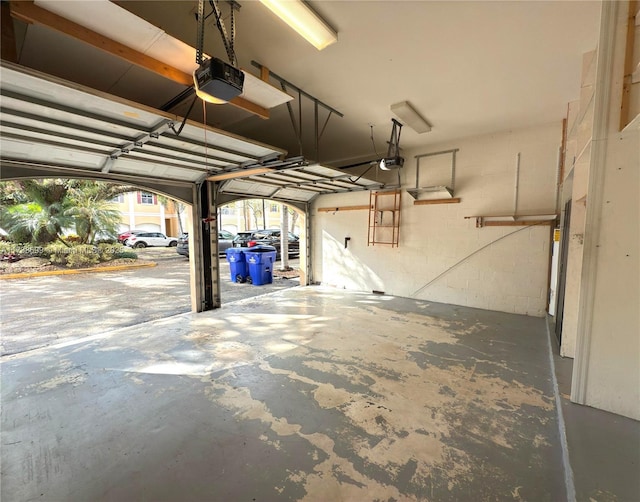 garage featuring a garage door opener