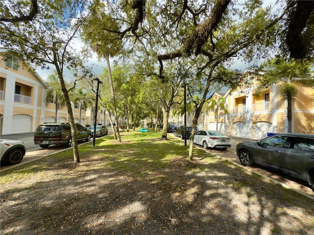 view of yard featuring a residential view