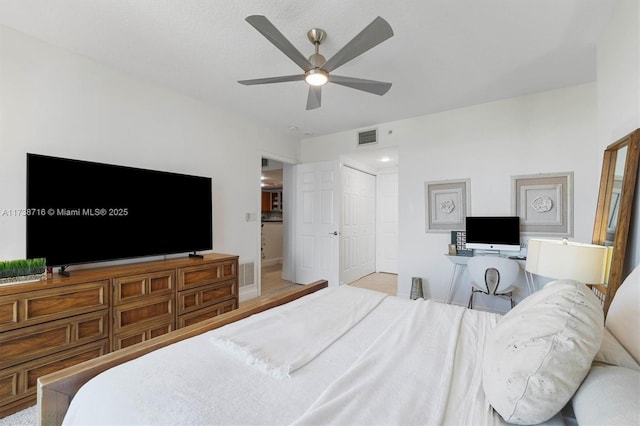 bedroom featuring a closet and ceiling fan