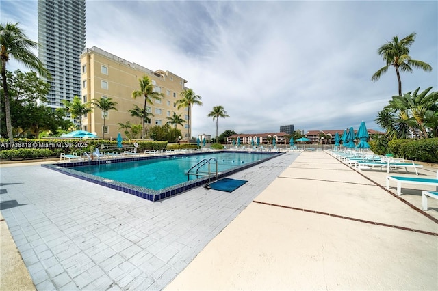 view of pool featuring a patio area