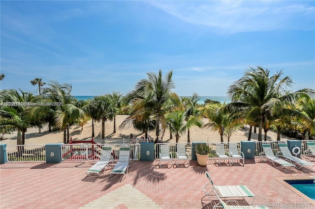 view of patio / terrace with a water view