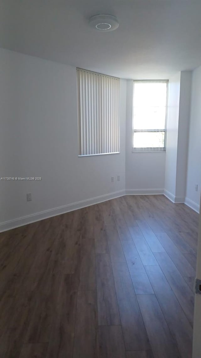 510 NW 84th Ave Unit 518, Plantation, FL 33324 - empty room featuring baseboards and dark wood finished floors