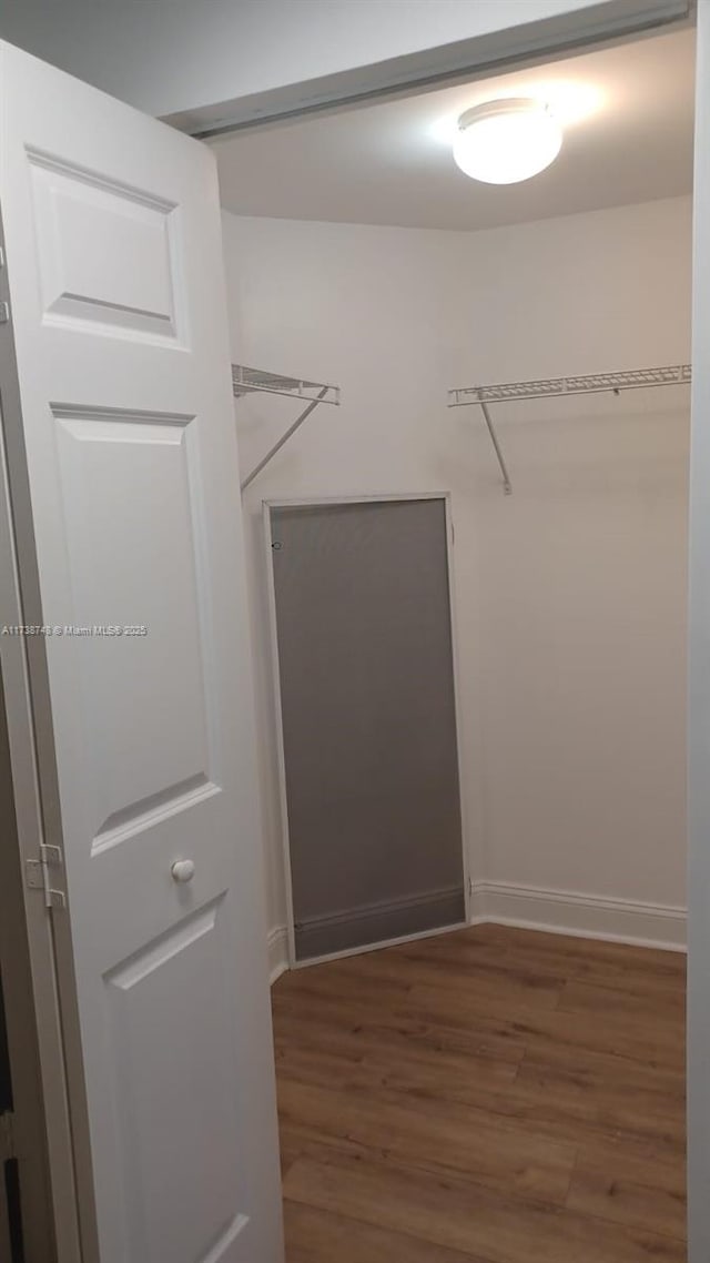 510 NW 84th Ave Unit 518, Plantation, FL 33324 - walk in closet featuring wood finished floors