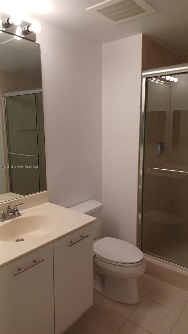 510 NW 84th Ave Unit 518, Plantation, FL 33324 - full bath with tile patterned flooring, toilet, visible vents, vanity, and a shower stall