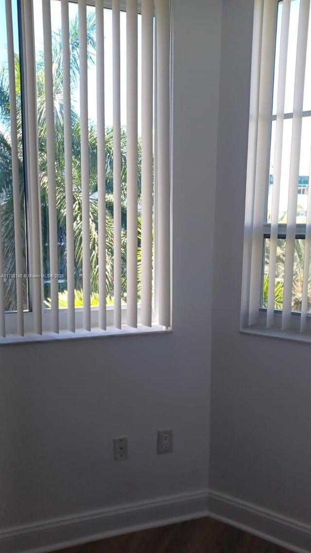 510 NW 84th Ave Unit 518, Plantation, FL 33324 - spare room featuring a healthy amount of sunlight and baseboards
