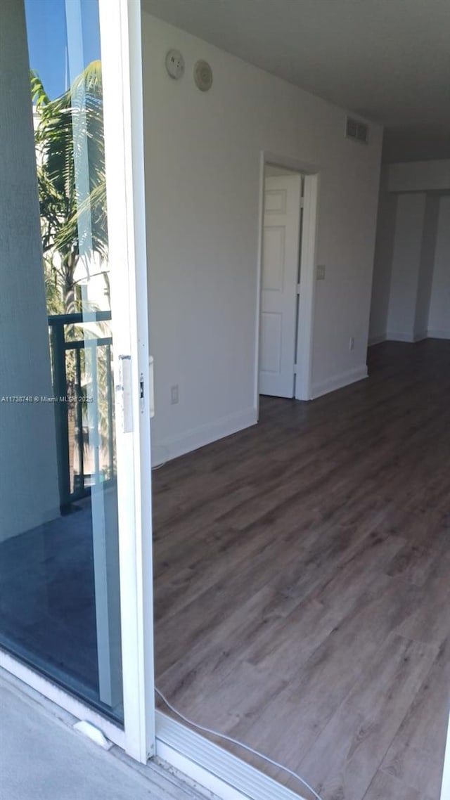 510 NW 84th Ave Unit 518, Plantation, FL 33324 - spare room featuring visible vents, baseboards, and wood finished floors
