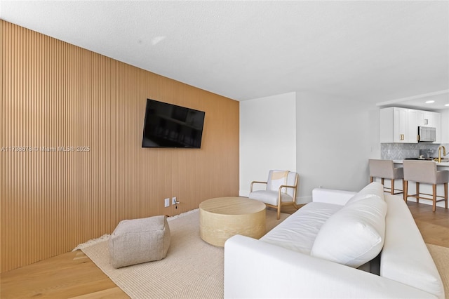 living room with hardwood / wood-style flooring