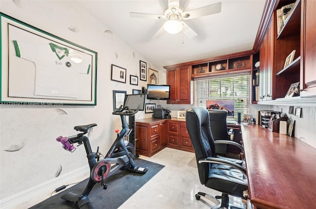 office area featuring ceiling fan and lofted ceiling