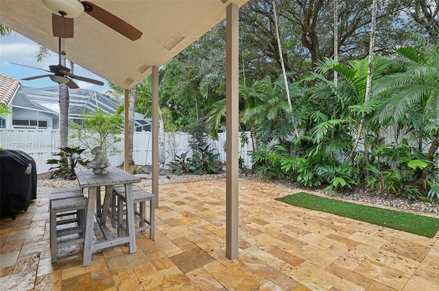 view of patio / terrace with a grill and ceiling fan