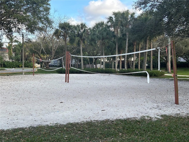 view of home's community featuring volleyball court