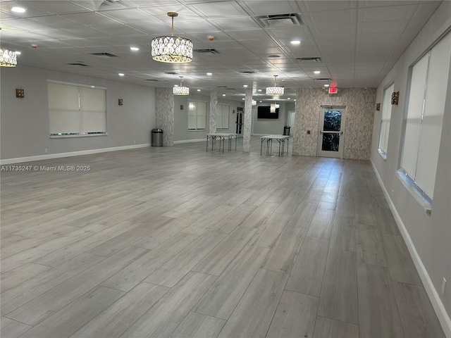 empty room with light hardwood / wood-style floors