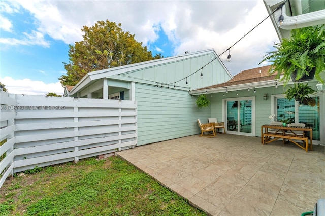 rear view of house featuring a patio area