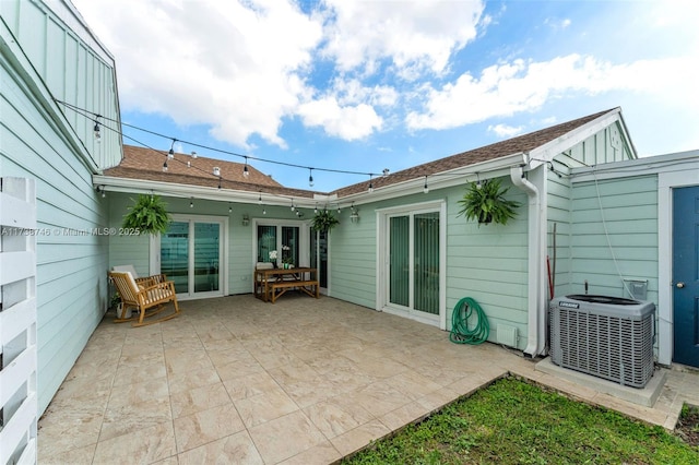 view of patio with central AC