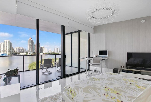 tiled bedroom featuring floor to ceiling windows