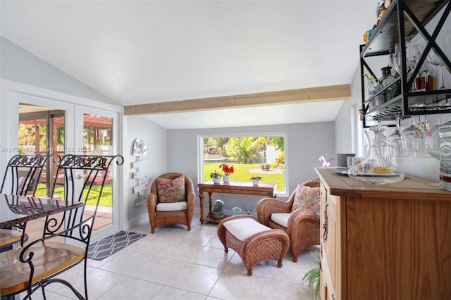 living area with french doors, light tile patterned floors, and vaulted ceiling with beams