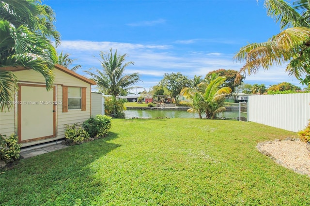 view of yard with a water view