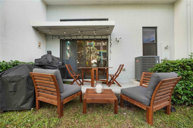 view of patio / terrace with a grill and cooling unit