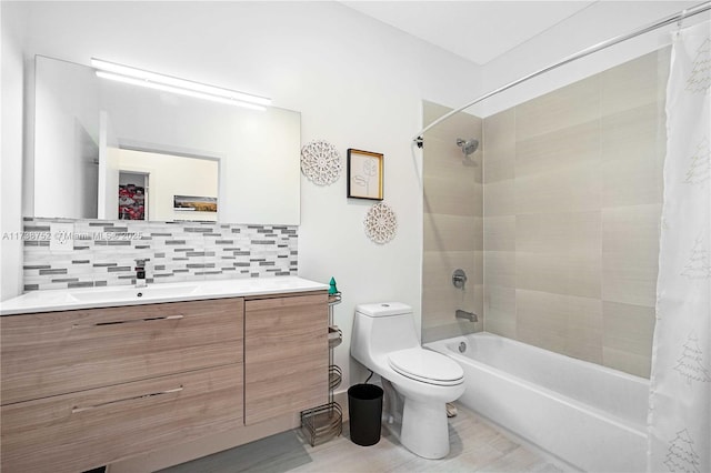 full bathroom with tasteful backsplash, shower / tub combo, vanity, and toilet