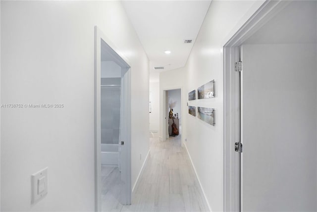 hall featuring light hardwood / wood-style flooring