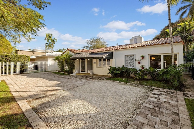 rear view of house featuring a patio area