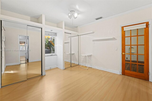 full bathroom featuring tile walls, vanity, tile patterned floors, toilet, and shower / bath combo with shower curtain