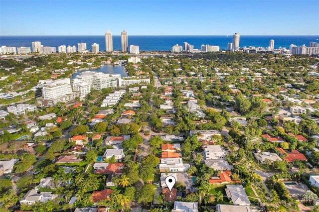 drone / aerial view with a water view